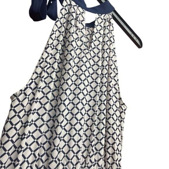 Navy and White classy dress it’s a small I didn’t loose enough weight to fit - Picture 2 of 9